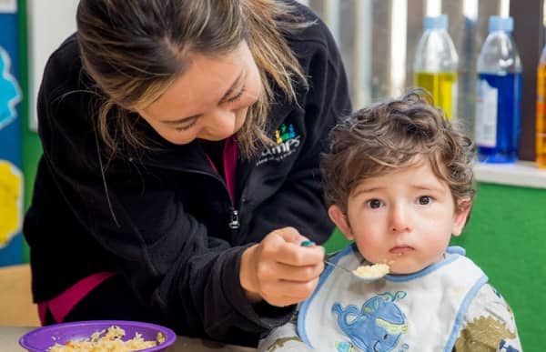 Blockhouse bay teacher feeding food