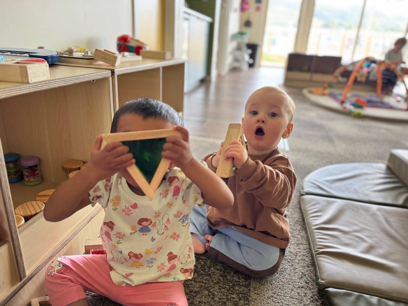Kenepuru landing infants exploring coloured shape blocks